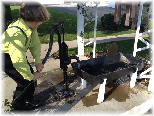 Amish boy with well pump 10/17/14