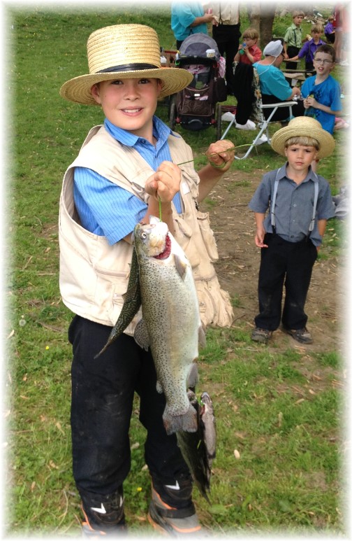 Amish boy holding fish 5/16/15