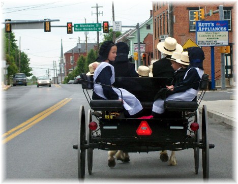 Amish family going to church