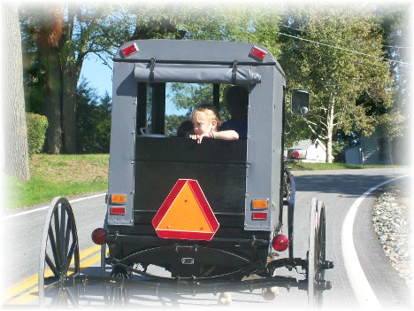 Amish buggie with child. Meadow View Road, Lancaster County PA
