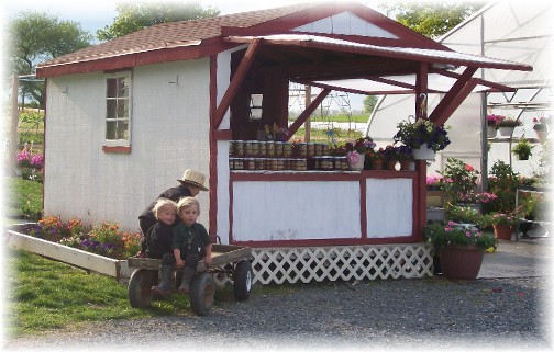 Creekside greenhouse (children on wagon) 5/7/11