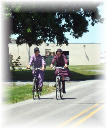 Old order Mennonite girls on bikes 6/2/11