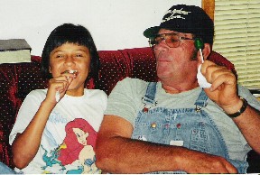 Brooksyne's dad, Brooklyn, with Ester sharing a lollipop