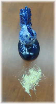 Porcelain chicken with feed