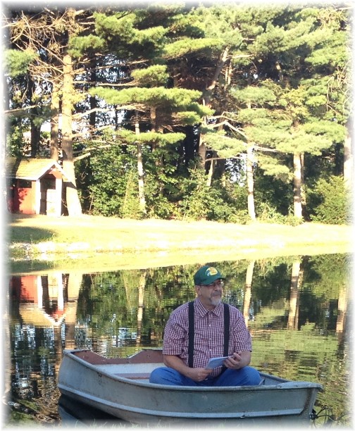 Preaching from boat at Galilean service 8/24/14 (Click for larger view)