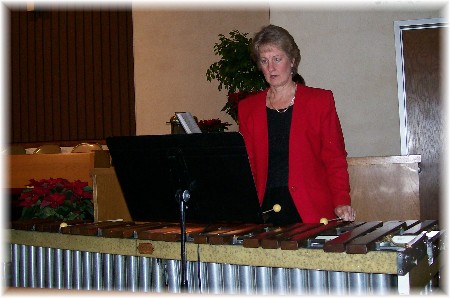 Lu playing the Marimba