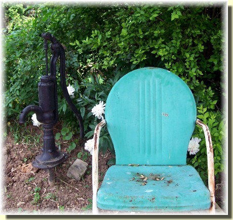 Old water pump & chair