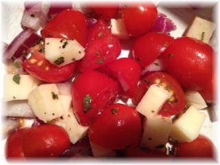 Tomatoes with mozzarela, basil