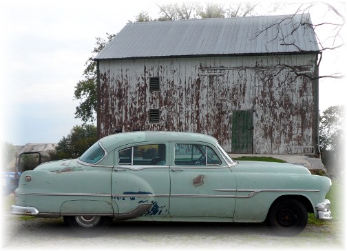 1953 Pontiac sedan and barn