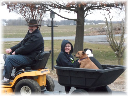 Stephen and Ester with pets on lawn tractor 2/22/13