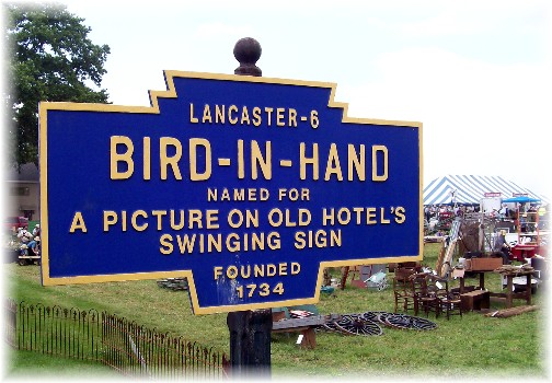 Bird-In-Hand road sign at the Lancaster County Carriage & Antique Auction in Bird In Hand PA.