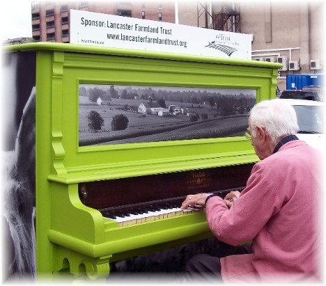 Outdoor pianist at Central Market, Lancaster, PA