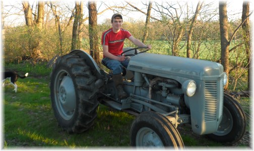 Riding great-grandpa's tractor 4/13/13