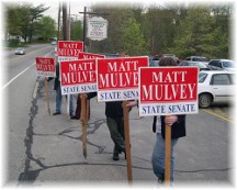 Campaign signholders in Massachusetts