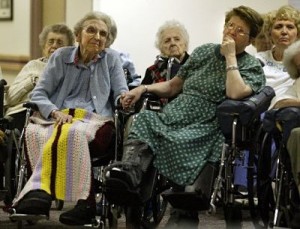 Residents at a nursing home chapel service