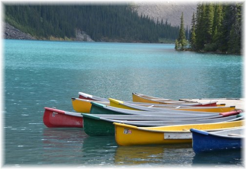 Canoes on mountain lake (Doris High)