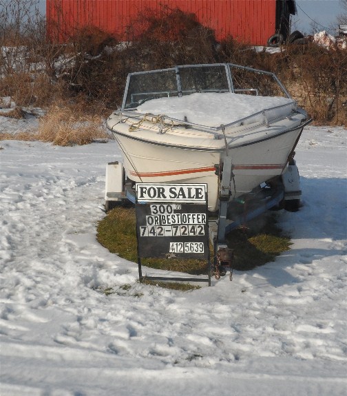 Boat for sale in snow