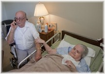 Elderly couple (husband caring for wife who had stroke)