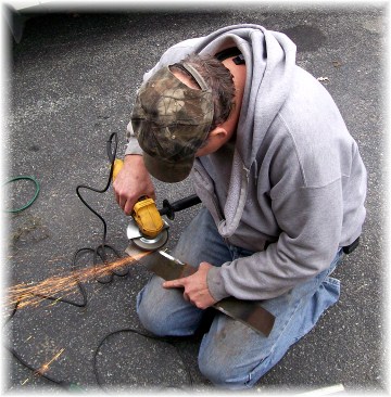 Chris Bert sharpening lawn mower blades 10/28/11