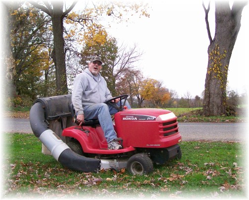 Chris Bert mowing lawn 10/28/11