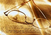 Open Bible with glasses