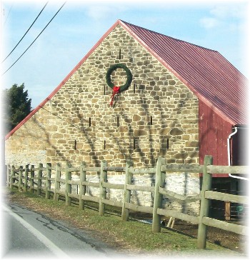Wreath on stone barn
