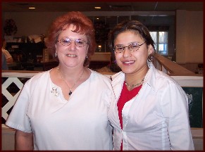 Ester with waitress at Esther's Restaurant