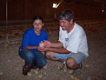 Photo of Ester with her youth group leader Stan in Chicken House