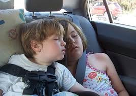 Children sleeping in car