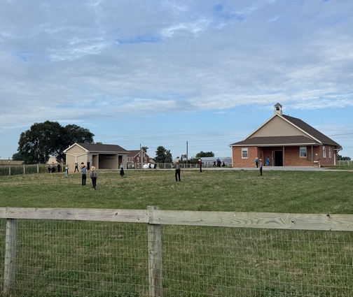 Playing baseball at Amish school