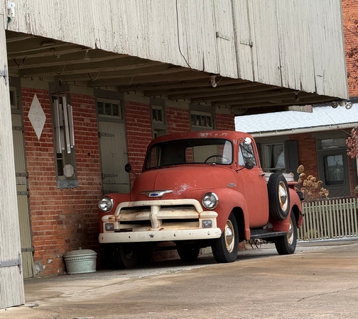 Truck under barn overhang
