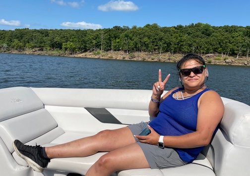 Ester on boat in Oklahoma
