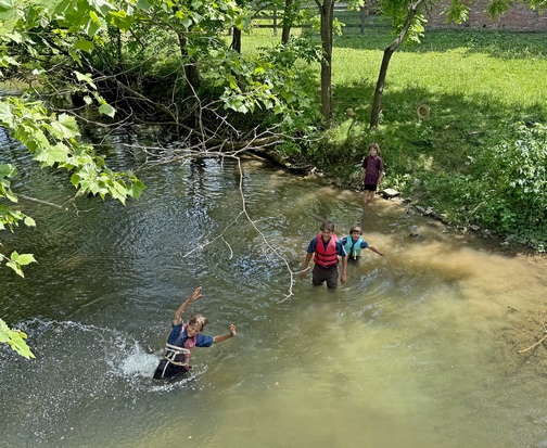 Boys playing in Donegal Creek