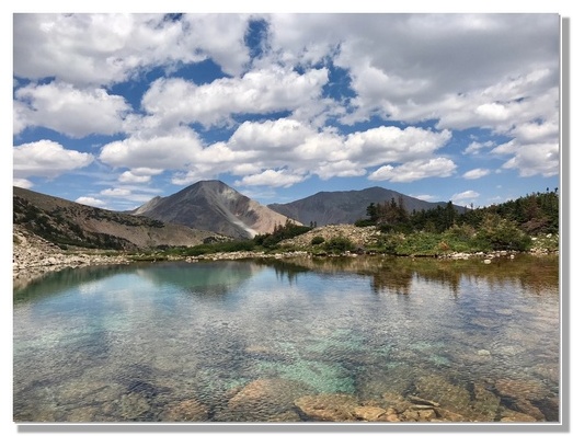 Rocky mountain scene (Photo by Jon Huber) click to enlarge