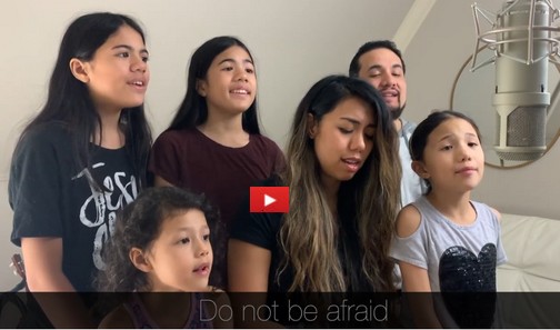 Family singing Scripture song