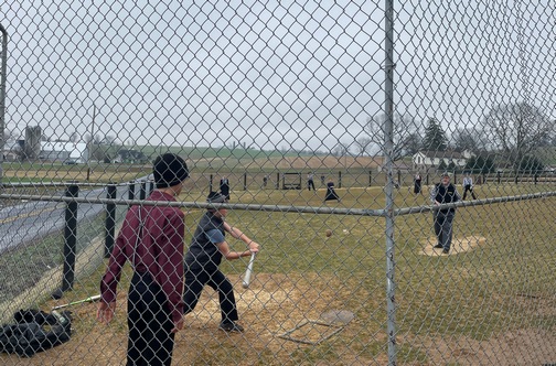 Pitching at an Amish school recess