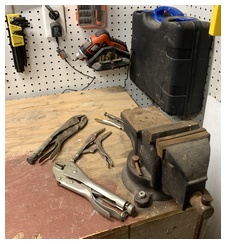 Bench vice and vice grips on my work bench