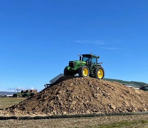 JD tractor on dirt pile in Lebanon County, PA 3/7/23