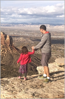 Father with daughter on bluff in Colorado 11/3/18